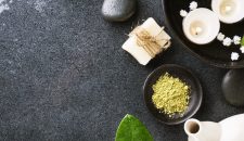 Spa Wellness Relax concept. Spa background with spa accessories on dark background. View from above with copy space. Square.