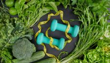 Workout and fitness dieting, Healthy food clean eating selection with fruits, vegetables, dumbbell ,Selection of healthy food concept. organic food, diet concept, copy space. flat lay. top view.