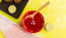 top-view-delicious-tomato-sauce-with-lemon-bread-loafs-yellow-table-soup-meal-vegetable-food